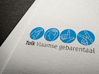 Logo Tolk Vlaamse gebarentaal
